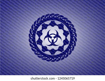 biohazard icon inside badge with jean texture