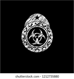 biohazard icon inside chalk emblem written on a blackboard