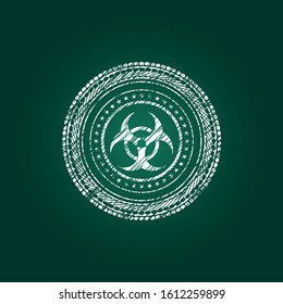 biohazard icon inside chalkboard emblem written on a blackboard