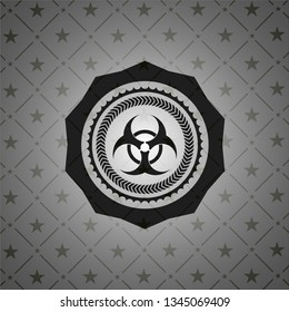 biohazard icon inside dark badge or emblem