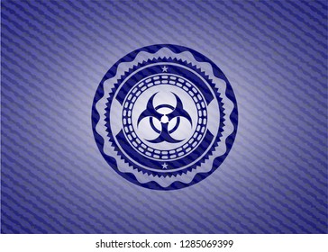biohazard icon inside denim background