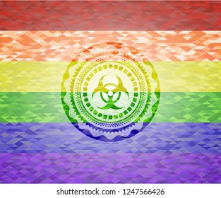 biohazard icon inside emblem on mosaic background with the colors of the LGBT flag