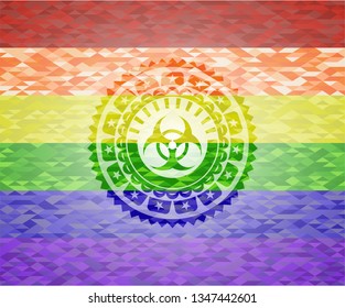 biohazard icon inside emblem on mosaic background with the colors of the LGBT flag
