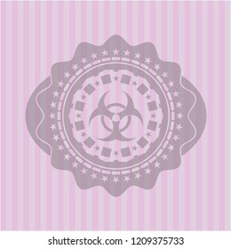 biohazard icon inside pink emblem