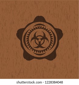 biohazard icon inside retro style wooden emblem