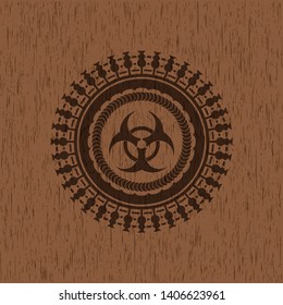 biohazard icon inside retro style wood emblem
