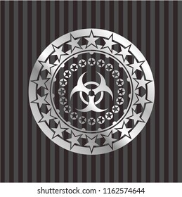biohazard icon inside silver emblem or badge