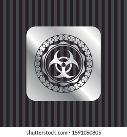 biohazard icon inside silver emblem or badge