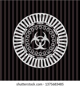 biohazard icon inside silvery emblem