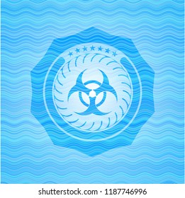 biohazard icon inside water wave representation emblem.