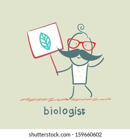 biologist holds a placard on which painted leaves