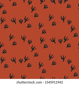 Bird animal footprint seamless vector pattern. Stylized repeat background clay brown texture.
