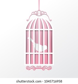 Bird in a cage on a pink background.