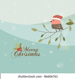 Bird With Christmas Hat on The Branch. Winter Time