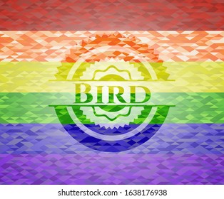 Bird emblem on mosaic background with the colors of the LGBT flag