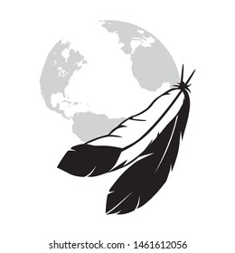 bird feathers with planet earth in behind 