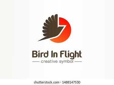 Bird in flight, sunsetcreative symbol concept. Pigeon silhouette with spread wing abstract business logo idea. Phoenix, dove, red sun icon. Corporate identity logotype, company graphic design tamplate