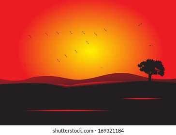 Bird. Flock of birds on the background of mountains and the sun and tree on red background