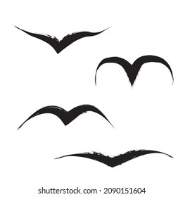 Bird in fly. Flock of birds .Dispersed grunge brush line .Vector logo illustration. Brush strokes .
