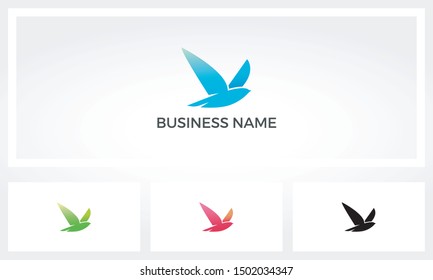 Bird Flying With Its Wings Logo