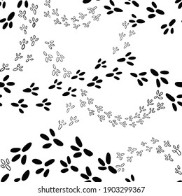Bird footprints of different sizes seamless pattern. Background with bird's tracks. Black and white vector.