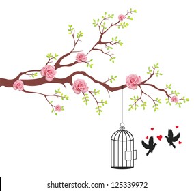 Bird is freeing from the cage to it's couple lover in rose flower tree branch. This is a love and romantic conceptional abstract picture.