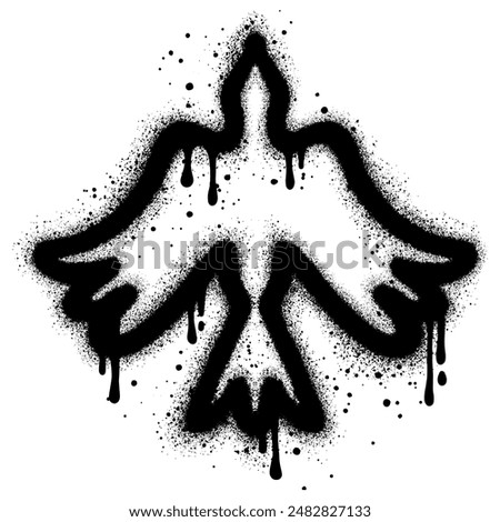 Bird graffiti with black spray paint.