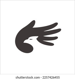 bird and hand negative space logo