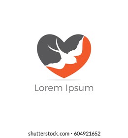 Bird in heart vector design. Loving and caring bird logo.