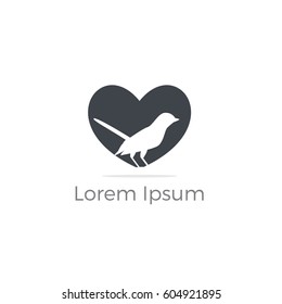 Bird in heart vector design. Loving and caring bird logo.