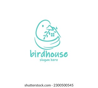 Bird holds in its beak a branch with leaves in the form of a house logo design. The bird flaps its wing, which looks like a nest graphic design