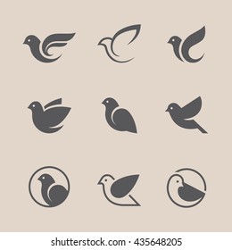 Bird icons set. Dove and pigeon abstract symbol. Can be used for freedom or peace, spa, beauty, health or family care center logo concept