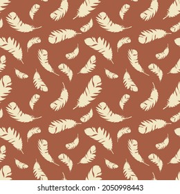 Bird light feathers fly on a brown background. Seamless pattern for modern fabrics, trendy textiles, decorative pillows, paper. Vector.
