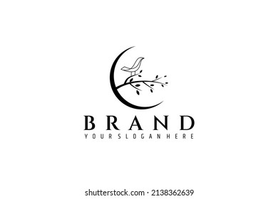 bird logo perching on tree branch with crescent moon background