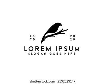 bird on a branch logo. bird silhouette in branch tree