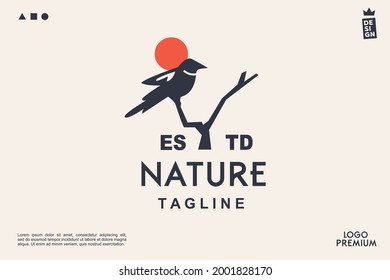 bird on a branch with the sun. nature vintage retro logo design