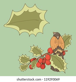 Bird on a holly branch on a green backgrounds