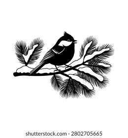 Bird perched on snowy pine branch