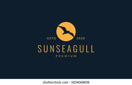 bird seagull fly on sunset logo vector illustration design