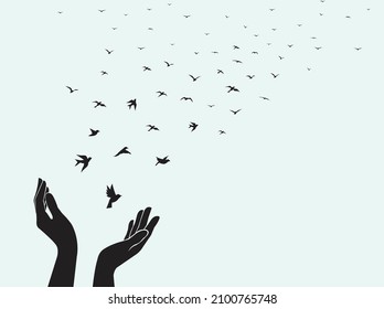 Bird set free , bird flying for freedom from an open hand, freedom concept, silhouette of a bird released from hand. World bird day. vector illustrations - Shutterstock ID 2100765748