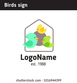 A bird sign near the birdhouse, a sign for the children's educational center