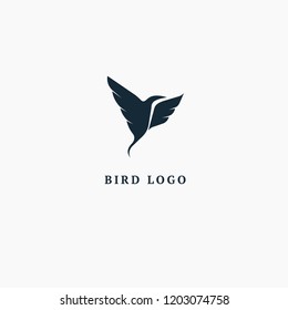 Bird silhouette logo. Vector abstract minimalistic illustration flying fowl. Pigeon icon. Zoo, pet shop, farm, bird feather, wild nature vector flat style logotype modern.