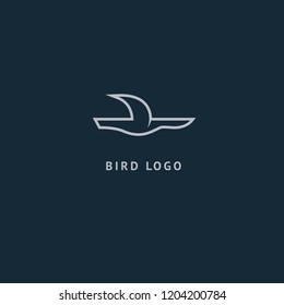 Bird silhouette logo. Vector abstract minimalistic illustration flying fowl. Gull icon. Zoo, pet shop, farm, bird feather, wild nature vector flat style logotype modern.