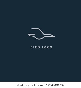 Bird silhouette logo. Vector abstract minimalistic illustration flying fowl. Gull icon. Zoo, pet shop, farm, bird feather, wild nature vector flat style logotype modern.