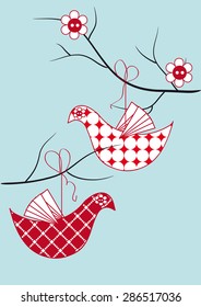 Bird toy hanging on the branches