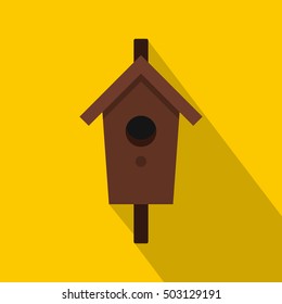 Birdhouse or nesting box icon. Flat illustration of birdhouse or nesting boxvector icon for web isolated on yellow background