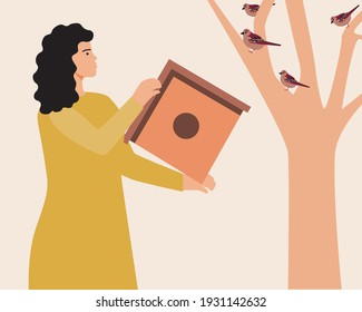 Casa de pájaros en un árbol y una mujer. Ilustración de material vectorial plano. La persona transmite el alimentador de aves. Cuidar de la naturaleza. Concepto de ecología. Los pájaros viven en una casa de aves