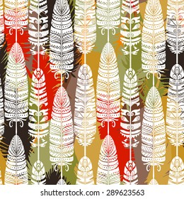 Birds feathers colorful seamless pattern. Repeating boho background texture, natural print. Fabric design, wallpaper 