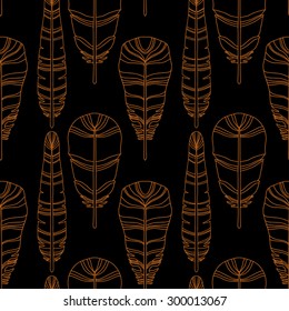 Birds feathers seamless pattern in black and gold. Repeating background texture, natural print. Fabric design, wallpaper 