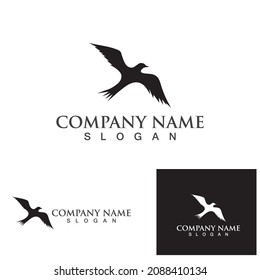 Birds fly on the beach logo